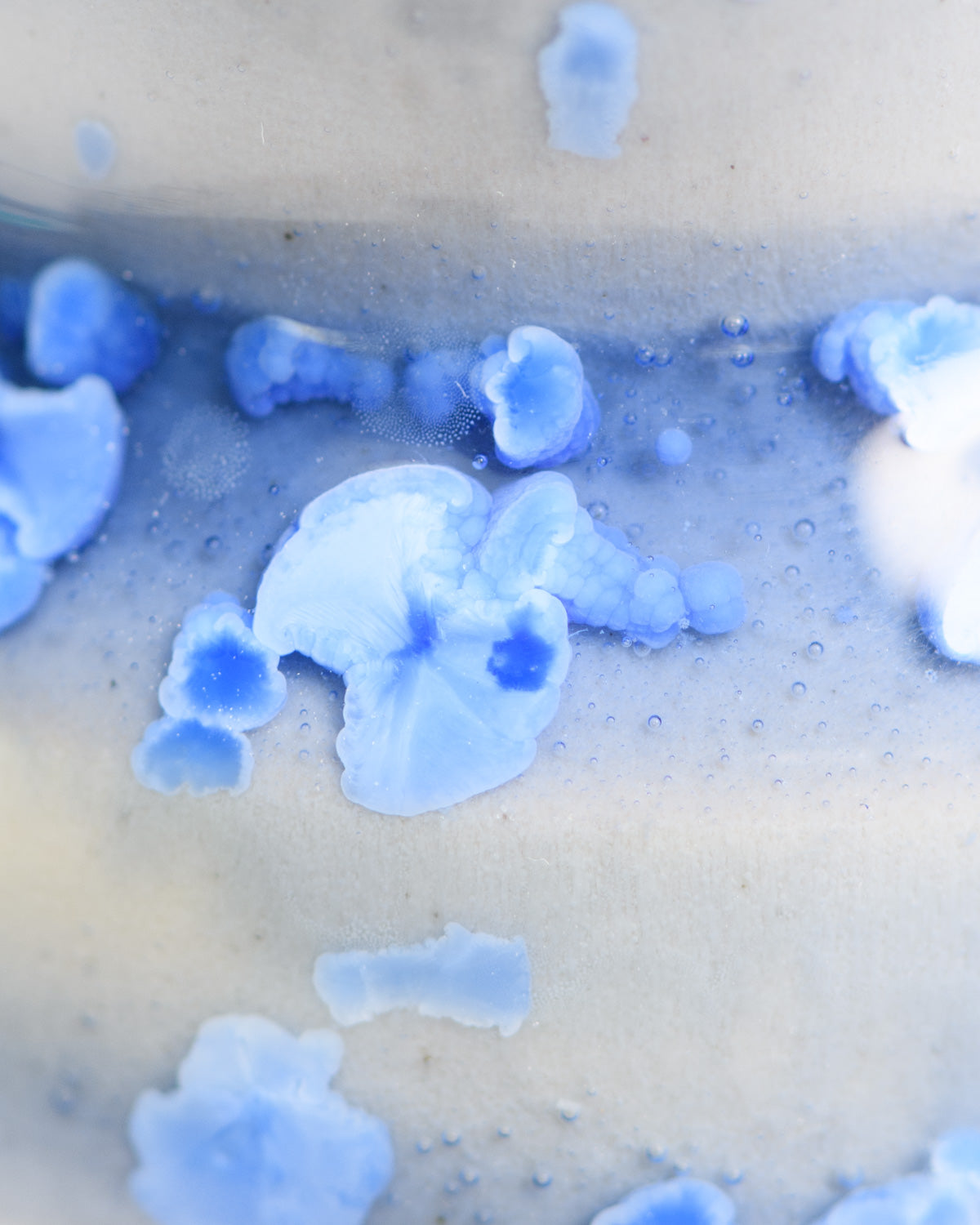 Close up of crystal in a piece glazed with Crystal Blue