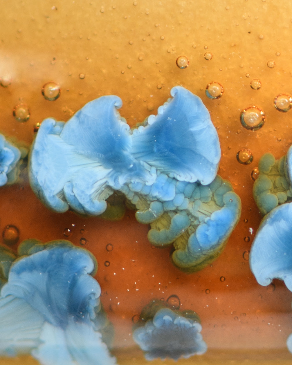 Close up of crystal in a piece glazed with Crystal Amber-Blue